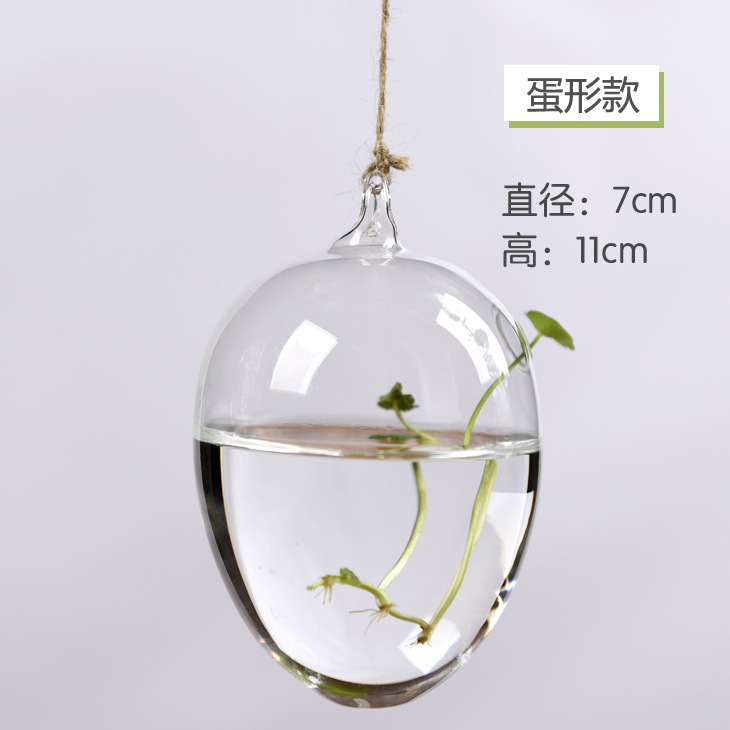 Fábrica directa colgando florero de vidrio transparente simple hidropónico pequeña botella colgante interior jardinería decoración del hogar botella planta