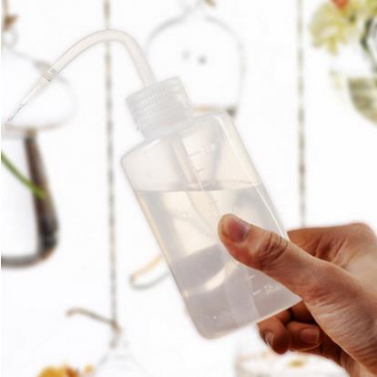 Fábrica directa colgando florero de vidrio transparente simple hidropónico pequeña botella colgante interior jardinería decoración del hogar botella planta