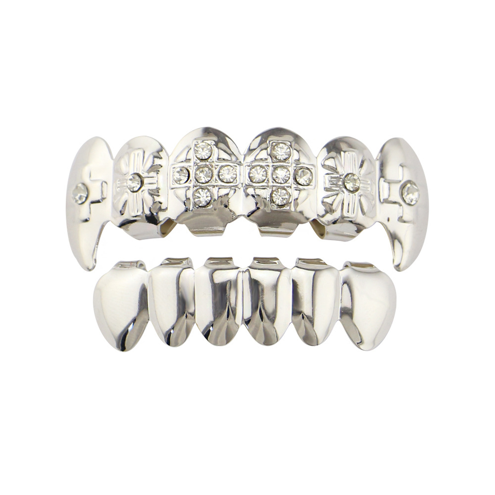 18 electrochapado diamante incrustado hip hop tirantes adecuado para hombres y mujeres europeos y americanos de Halloween tigre dientes vampiro dientes falsos dientes puntiagudos
