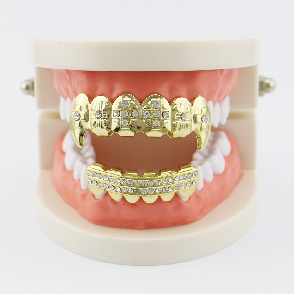 18 electrochapado diamante incrustado hip hop tirantes adecuado para hombres y mujeres europeos y americanos de Halloween tigre dientes vampiro dientes falsos dientes puntiagudos