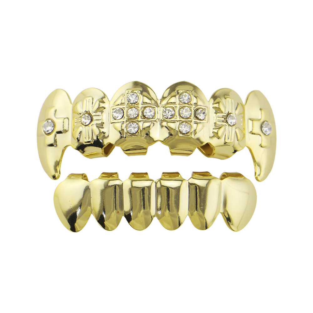 18 electrochapado diamante incrustado hip hop tirantes adecuado para hombres y mujeres europeos y americanos de Halloween tigre dientes vampiro dientes falsos dientes puntiagudos