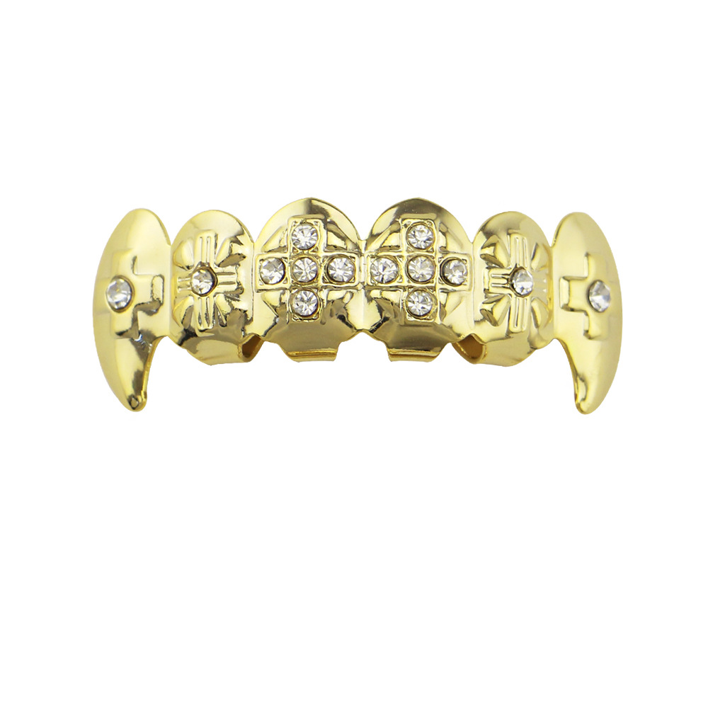 18 electrochapado diamante incrustado hip hop tirantes adecuado para hombres y mujeres europeos y americanos de Halloween tigre dientes vampiro dientes falsos dientes puntiagudos