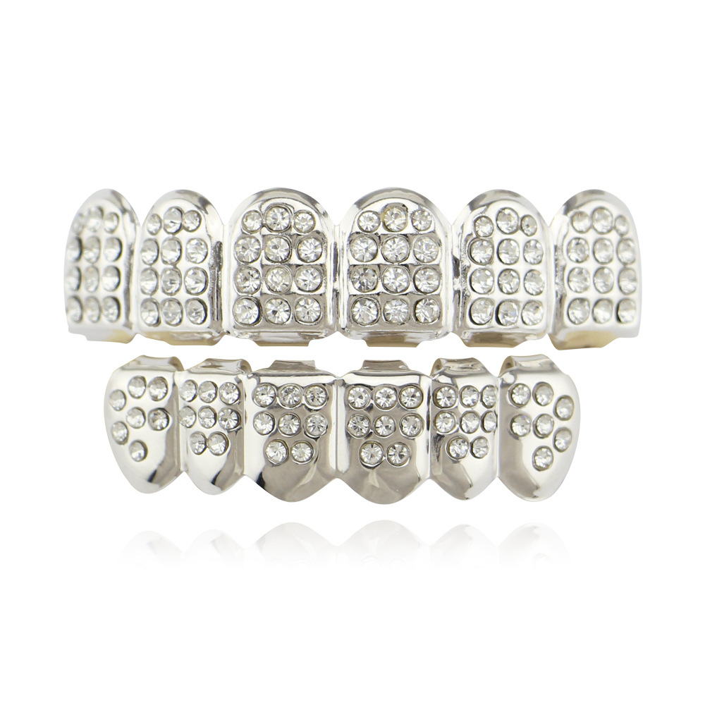 18K chapado en oro de color diamante hip hop tirantes parrillas hombres y mujeres adecuados diamante incrustado seis dientes vampiro colmillos Accesorios