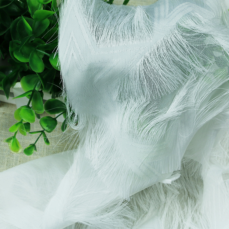 厂家直销 全涤提花剪花眼睫毛面料 时尚女装童装夏季服装面料