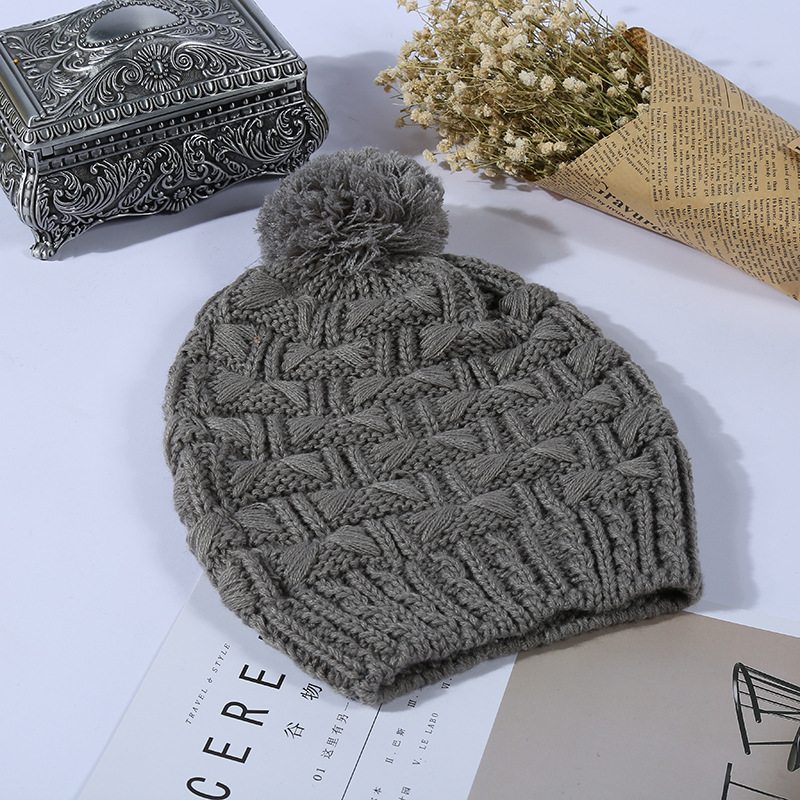 Fábrica personalizada Otoño e Invierno de punto sombrero creativo Twist sombrero de lana pareja caliente protección del oído Jersey sombrero todo-juego