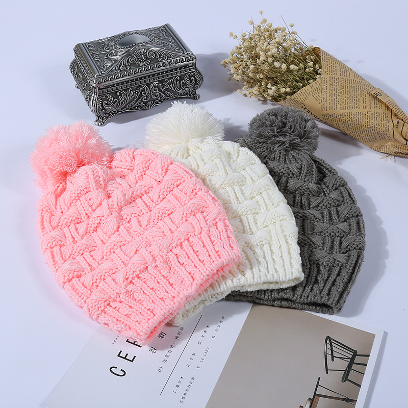 Fábrica personalizada Otoño e Invierno de punto sombrero creativo Twist sombrero de lana pareja caliente protección del oído Jersey sombrero todo-juego