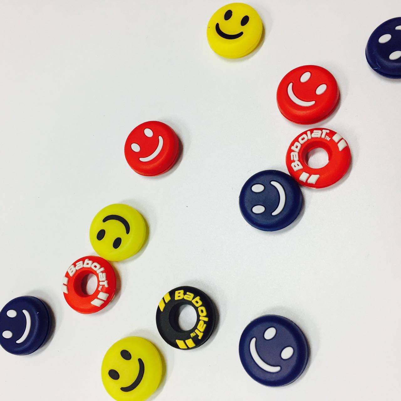 Wholesale tennis squash racket personality cute shock absorber inlaid shock absorber odorless silicone smiley face