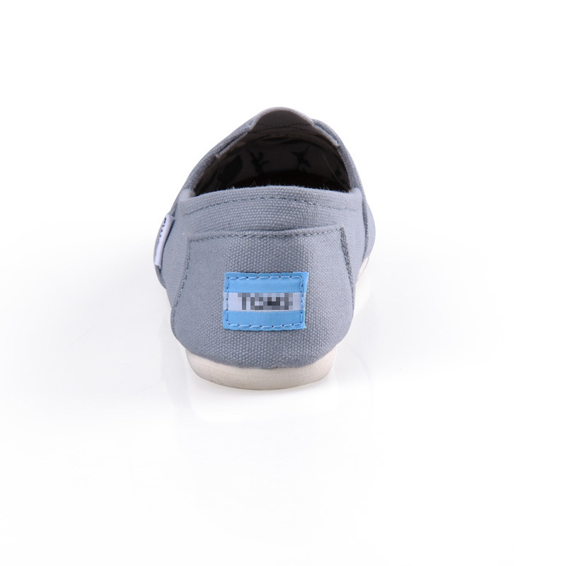 Comercio exterior transfronterizo europeo y americano Thomas zapatos de tela zapatos de lona para hombres y mujeres zapatos planos perezosos de color sólido de pareja sin cordones