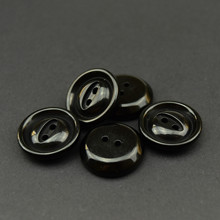 厂家直供树脂纽扣两眼内斜倒边猫眼扣鱼眼扣男女士毛呢大衣扣