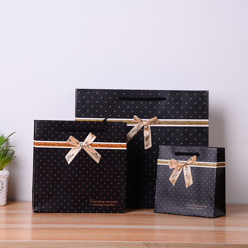 现货韩版简约礼品袋黑色斑点手提纸袋服装化妆品包装袋批发