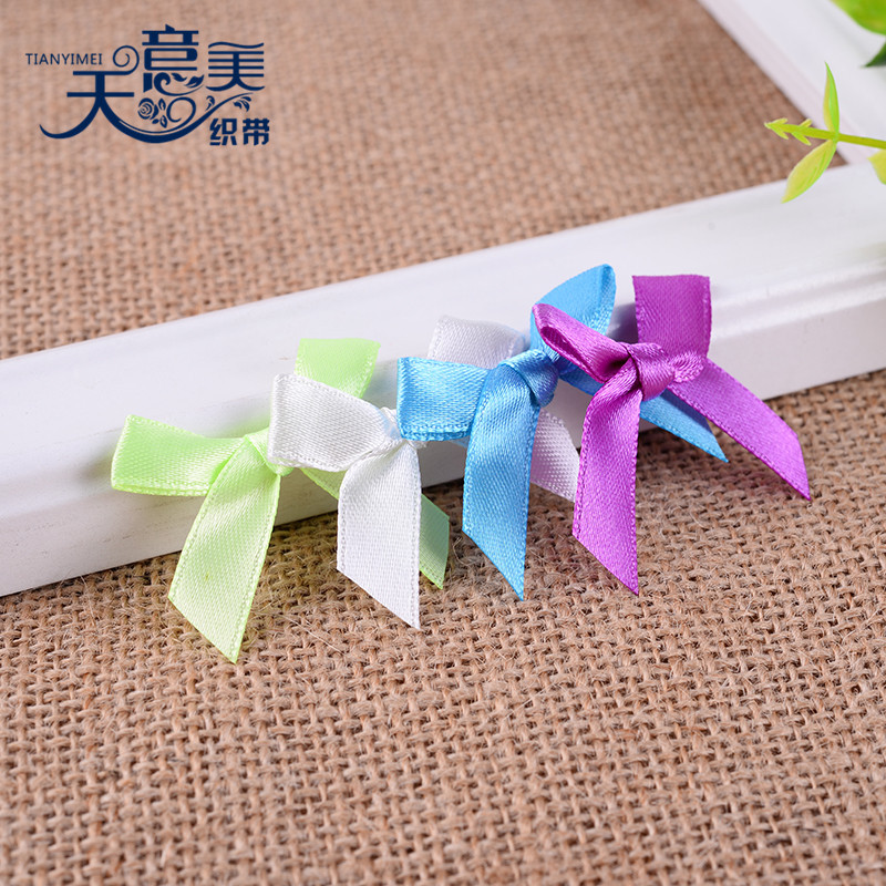 Fabricante en stock 1cm cinta anudada a mano accesorios textiles cinta arco producción