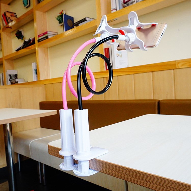 Soporte de teléfono móvil soporte de teléfono móvil perezoso Escritorio de cabecera espiral soporte de teléfono móvil soporte de coche entrega de una pieza