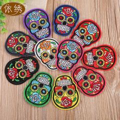 Embroidered patch with a rose, skeleton, and ghost head design, perfect for punk and computer embroidery, serving as a stylish and fashionable decoration.