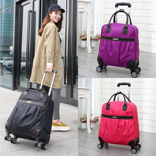 Universal suitcase on wheels, travel bag, capacious shoulder bag