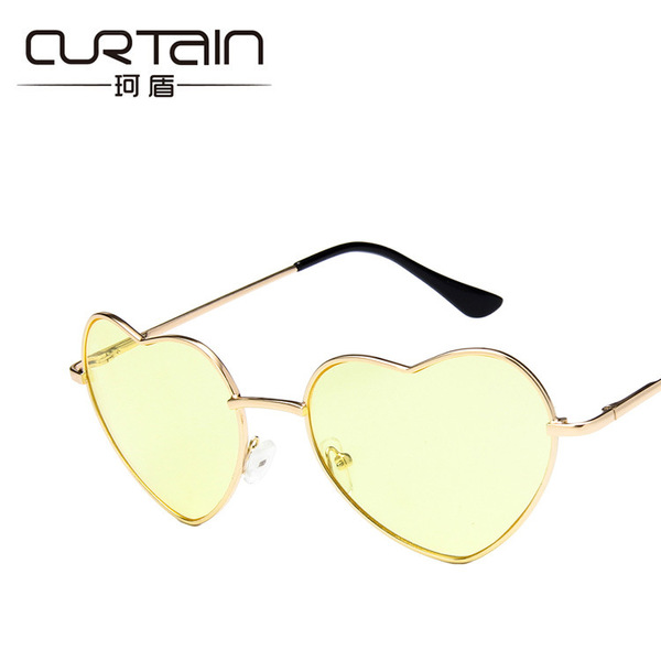 Retro fashionable sunglasses heart-shaped