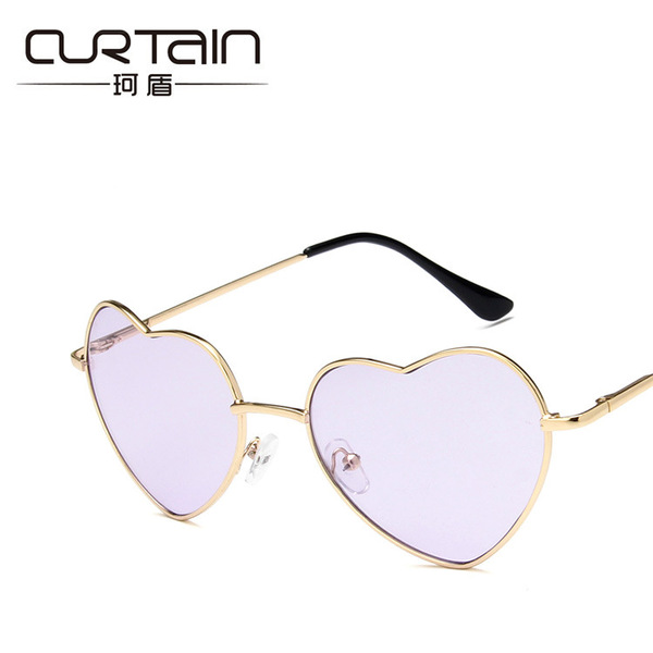 Retro fashionable sunglasses heart-shaped