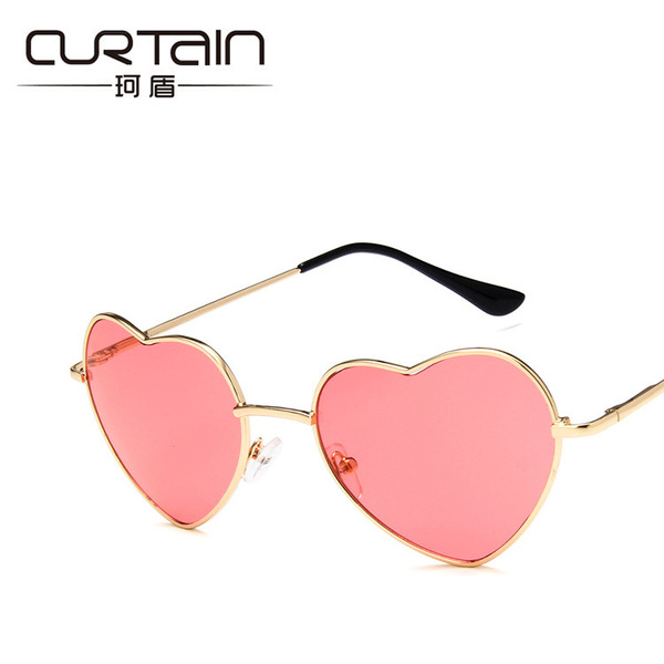 Retro fashionable sunglasses heart-shaped