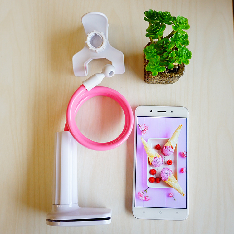 Soporte de teléfono móvil soporte de teléfono móvil perezoso Escritorio de cabecera espiral soporte de teléfono móvil soporte de coche entrega de una pieza