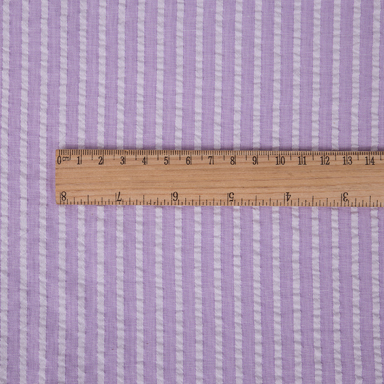 素色学生泡泡格服装面料新品上市 时尚睡衣提花棉服布料 色织布