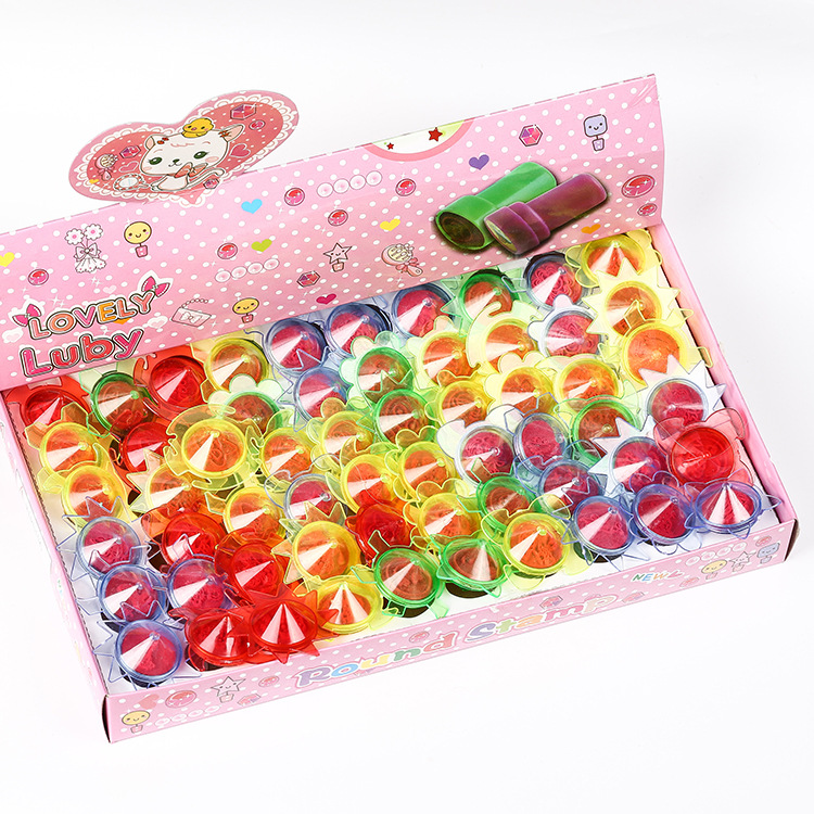 Nuevo plástico creativo Gyro juguete sello lindo color de dibujos animados de secado rápido cilíndrico sello de recompensa para niños