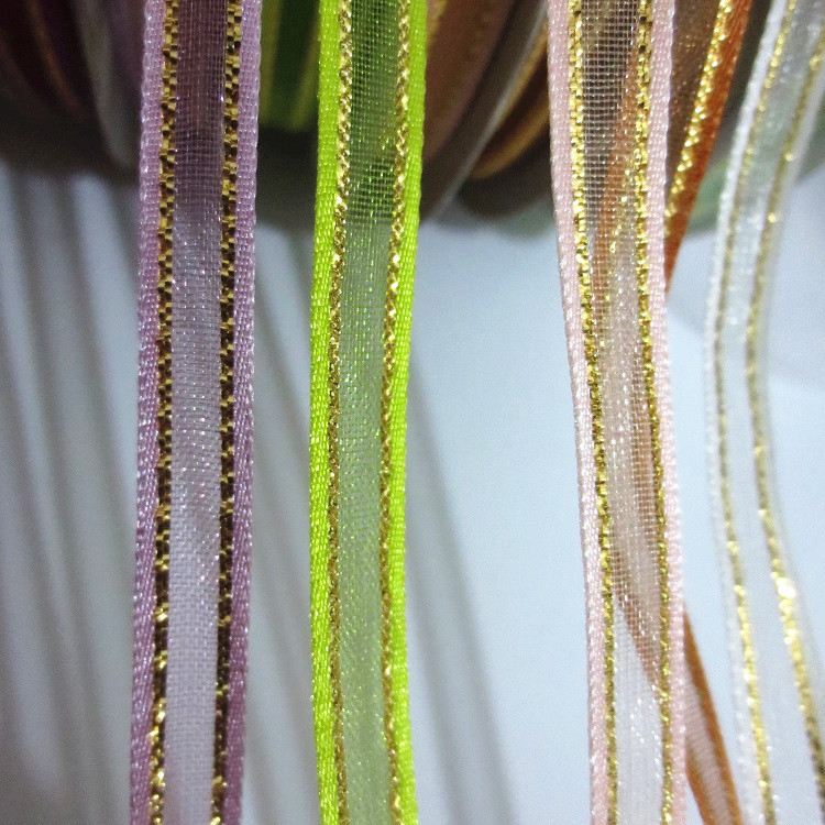 2分6mm幅の金の縁のリボンのガーゼのdiyの髪飾りの喜糖の箱はタグのしおりのリボンの蝶結びを飾ります。