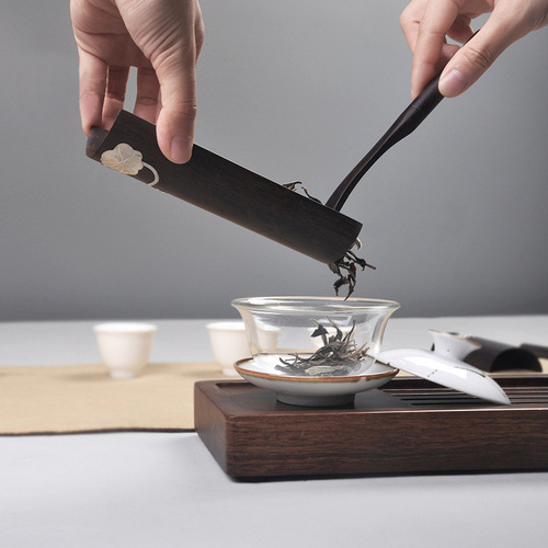Factory direct sales Kung Fu tea ceremony accessories pure tin lotus bergamot tea room wooden ornaments household ebony solid wood tea set