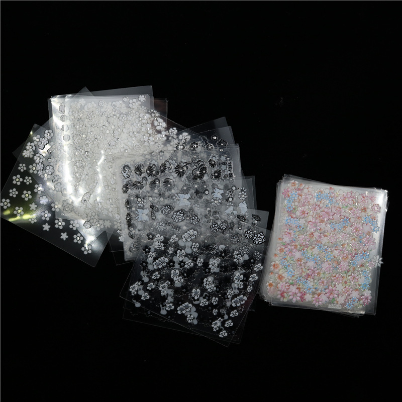 Yushang 50 piezas un conjunto de pegatinas de uñas calcomanías de uñas 3D pegatinas no repetidas buena adhesión pegatinas de uñas de flores