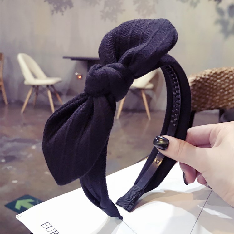 Corea del Sur simple nueva calidad de color sólido rayas Orejas de conejo arco borde ancho dentado antideslizante diadema para las mujeres