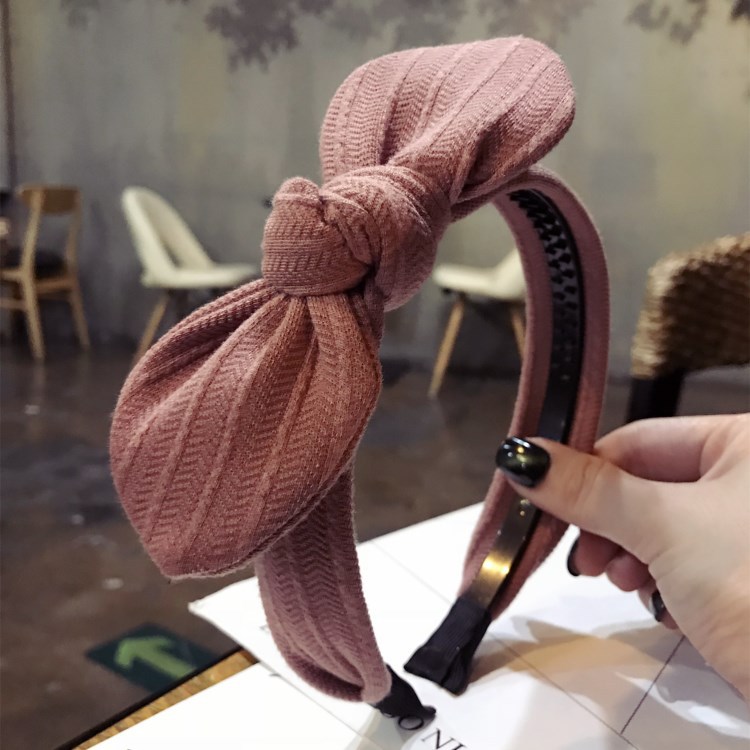 Corea del Sur simple nueva calidad de color sólido rayas Orejas de conejo arco borde ancho dentado antideslizante diadema para las mujeres