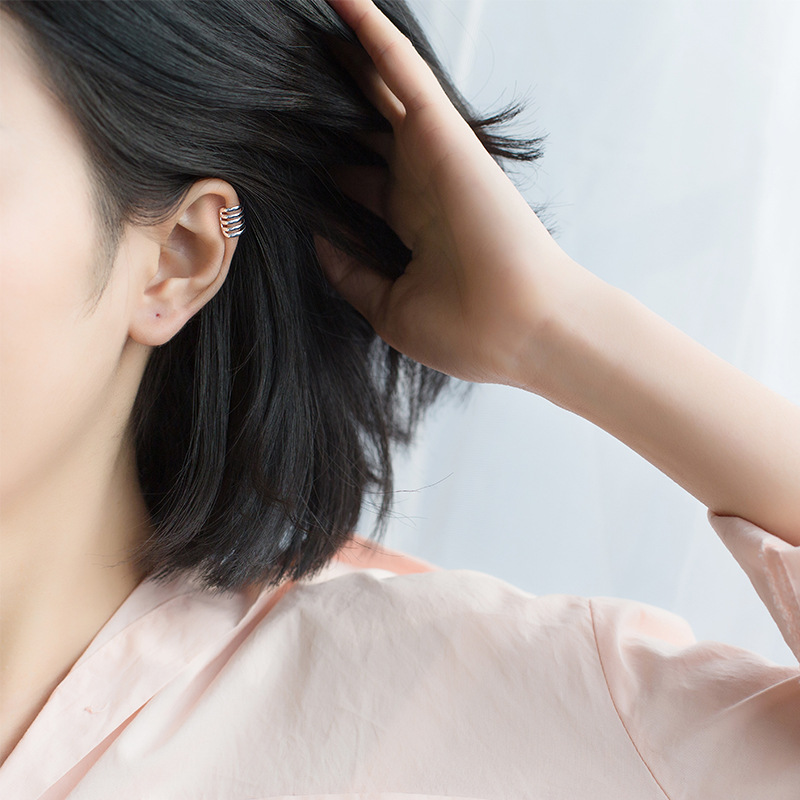 S925 plata hombre y mujer personalidad simple hueco tres o cuatro o cinco círculos sin agujeros de orejas multicapa de múltiples anillos auriculares E7273