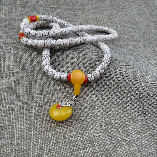 Multi-circle, yellow pendant, separated beads shipped randomly