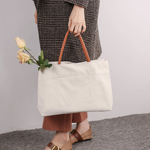 2024 new Korean capacity canvas bag ins style niche design portable shoulder bag tote bag shopping bag