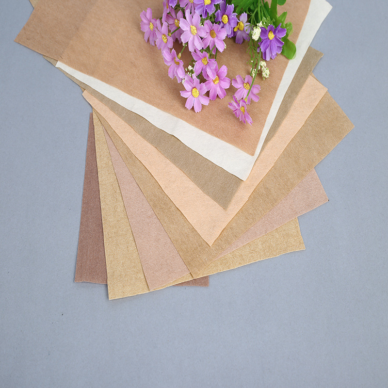 提供各种颜色膏药贴基布卷材，膏药贴底布肤色CT070P水刺无纺布