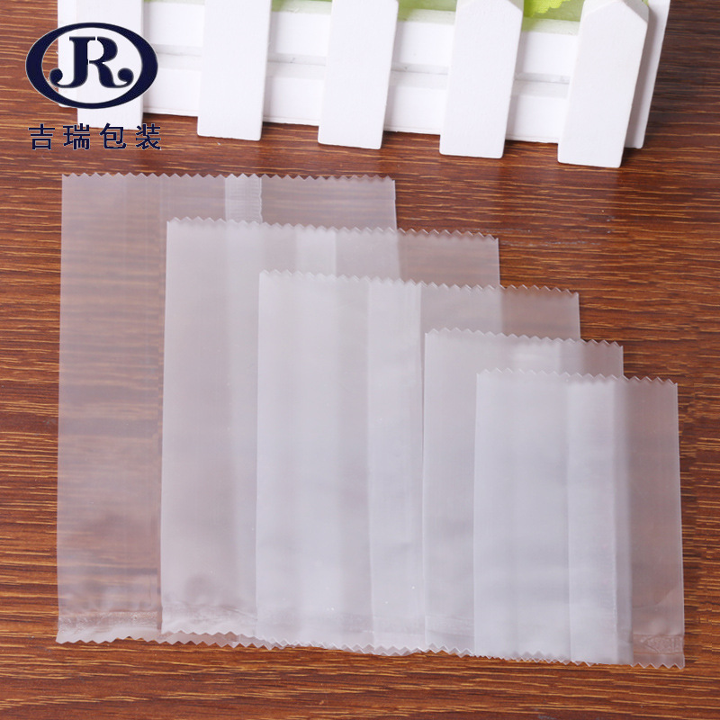 Spot snowflake crisp packaging bag high-grade Sawtooth frosted biscuit machine sealing bag baking packaging bag packaging bag