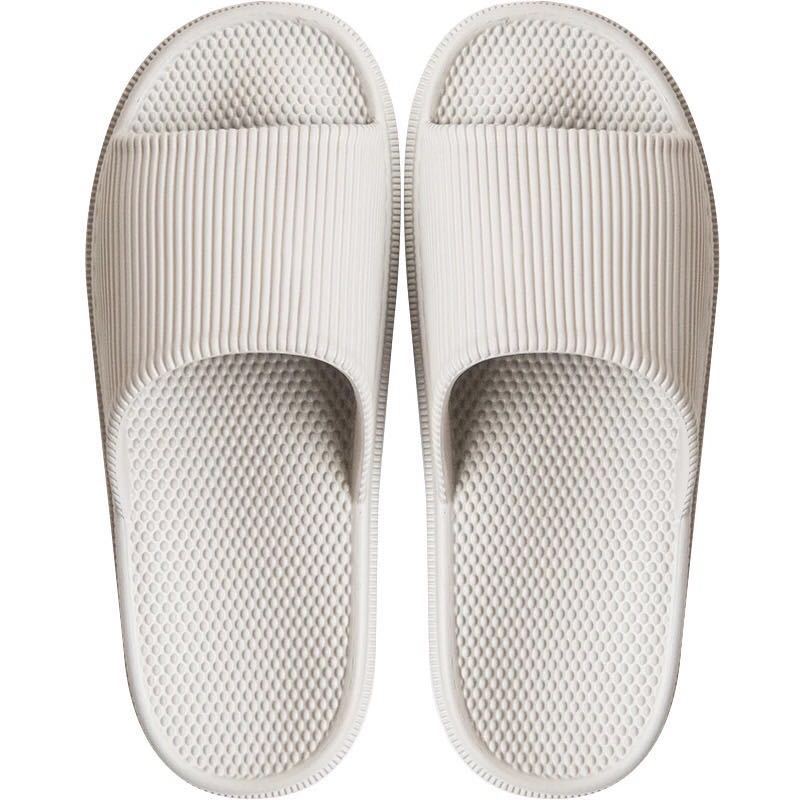 Hombres y mujeres pareja masaje de pies baño casa zapatillas interior inferior suave inferior grueso EVA zapatillas hombres