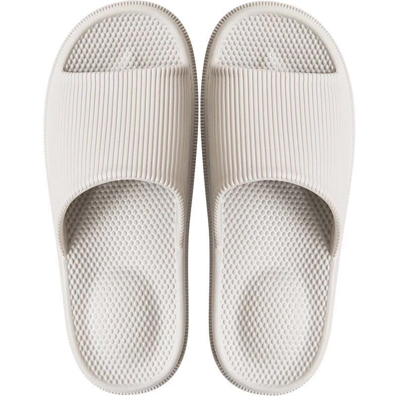 Hombres y mujeres pareja masaje de pies baño casa zapatillas interior inferior suave inferior grueso EVA zapatillas hombres