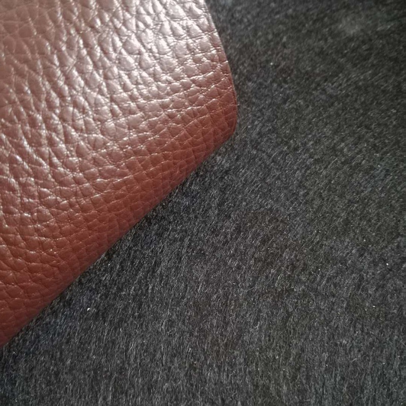 厂家直供pvc人造革面料经典荔枝纹皮革1.3mm针织棉底眼镜盒箱包革