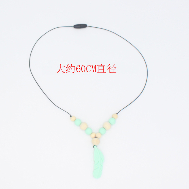 Directo de fábrica pluma mordedor collar bebé calmante teether protección seguridad bebé molar collar comercio exterior