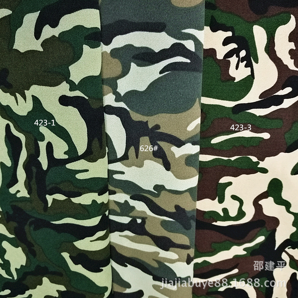 现货梭织涤纶迷彩布料华达呢 斜纹不扒丝 军训服面料 豹纹印花布