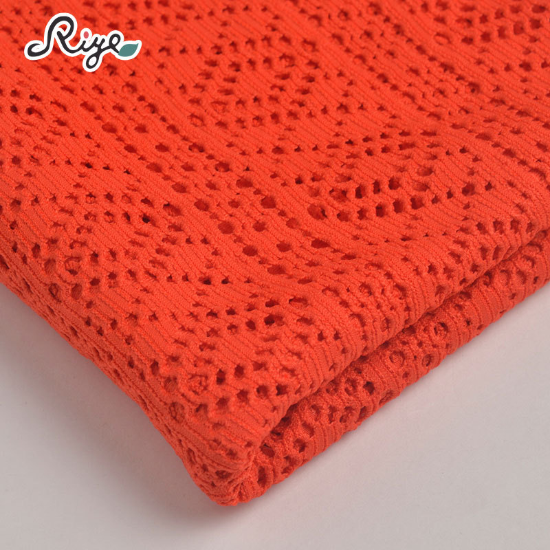 厂家现货 全涤单面提花面料 纯色几何花纹镂空提花布服装面料