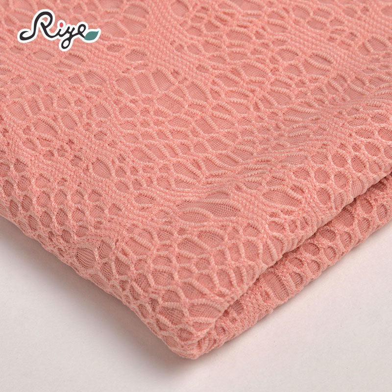 涤纶几何花纹面料素色单面提花布镂空间隔面料