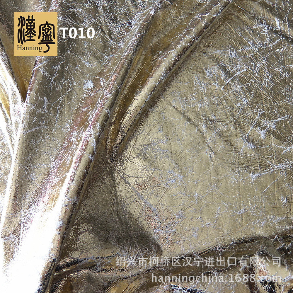 工厂现货 T010 经编【麂皮绒】爆裂烫金色膜香槟色服装面料 金属