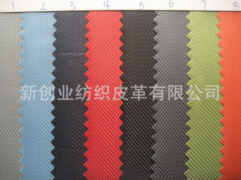 新款提花布箱包布钱包布料麻格布特殊纹路布料单色提花布涂PVC