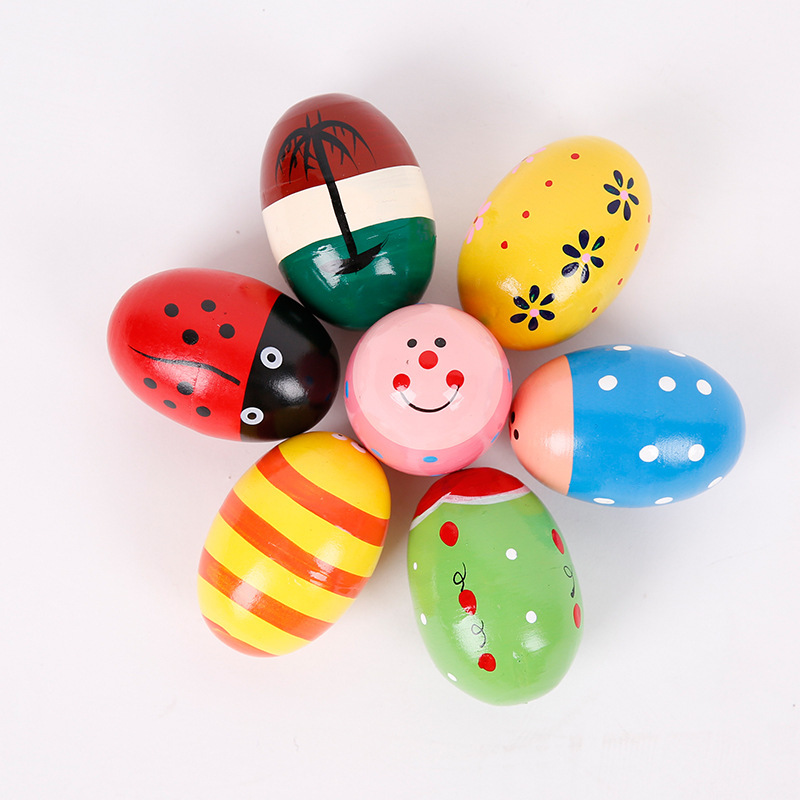 Nuevo exquisito huevo de arena de colores de alta calidad de madera redonda Bola de arena de los niños de educación temprana de inteligencia instrumento de percusión de juguete