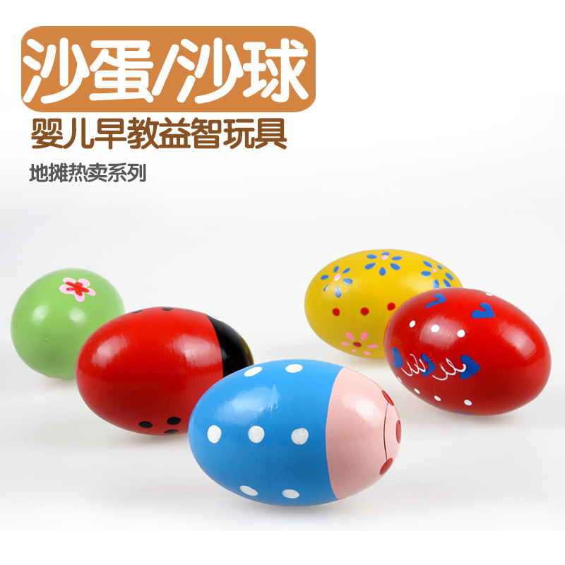 Nuevo exquisito huevo de arena de colores de alta calidad de madera redonda Bola de arena de los niños de educación temprana de inteligencia instrumento de percusión de juguete