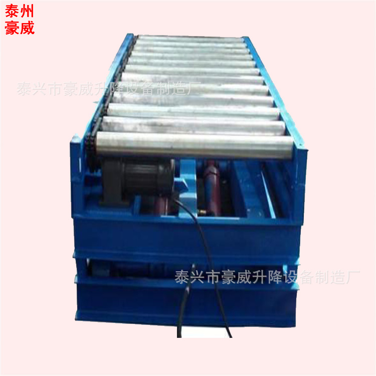 供应做圆滚式电动升降台 液压升高卸货平台 滚筒式电动高空作业车