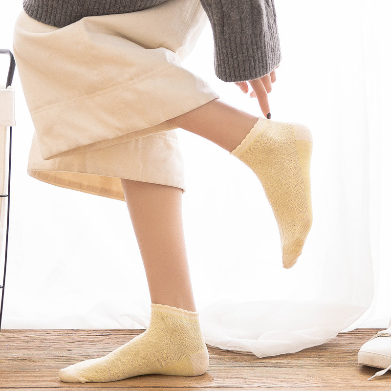 Primavera y verano nuevo barco de las mujeres calcetines color sólido malla burbuja boca algodón calcetines de las mujeres frescas llanura delgada calcetines para estudiantes