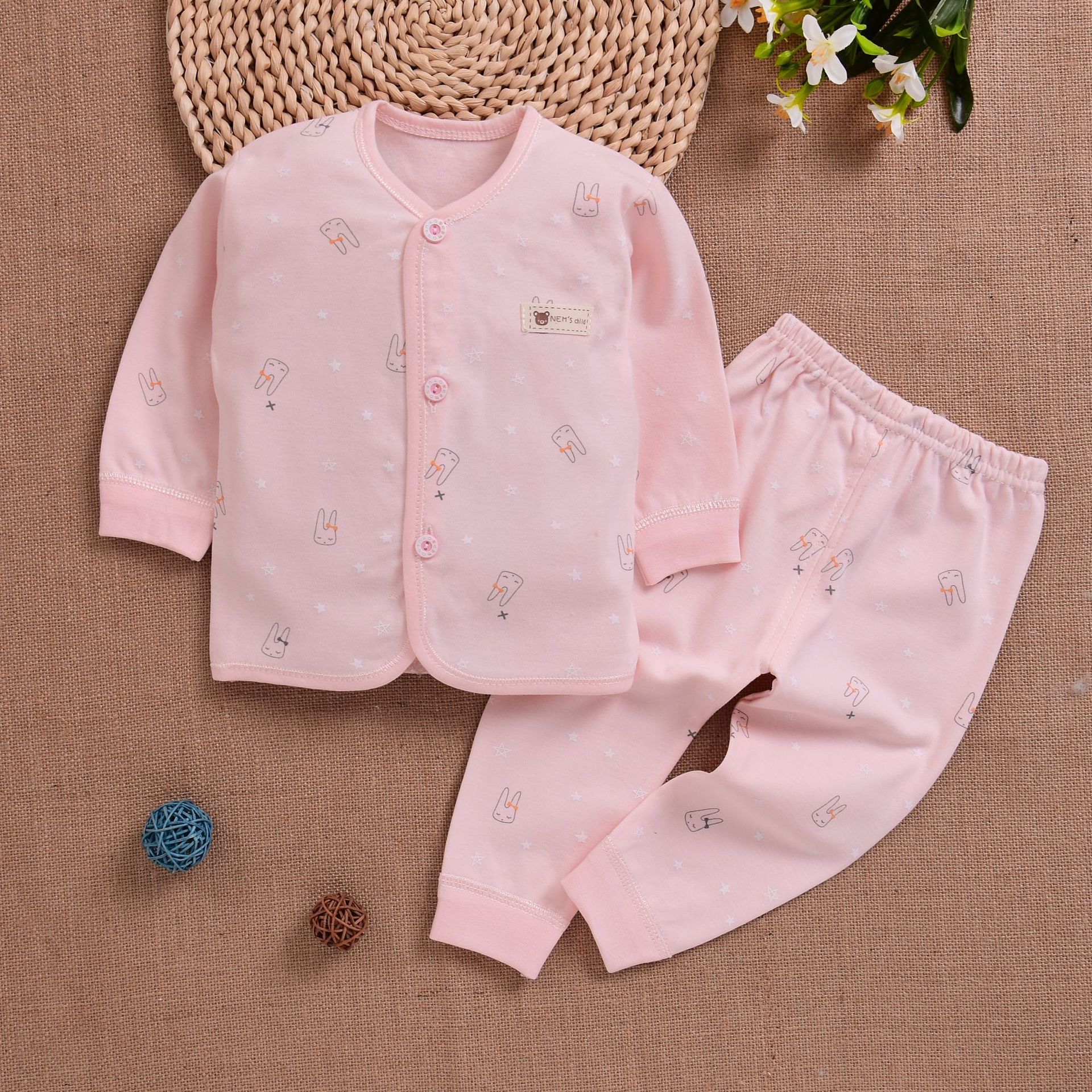 Conjunto de bebé de gran volumen de ventas de Anyang, conjunto de dos piezas de algodón peinado con botones a presión, conjunto de cuello redondo para bebé recién nacido, niño y niña.