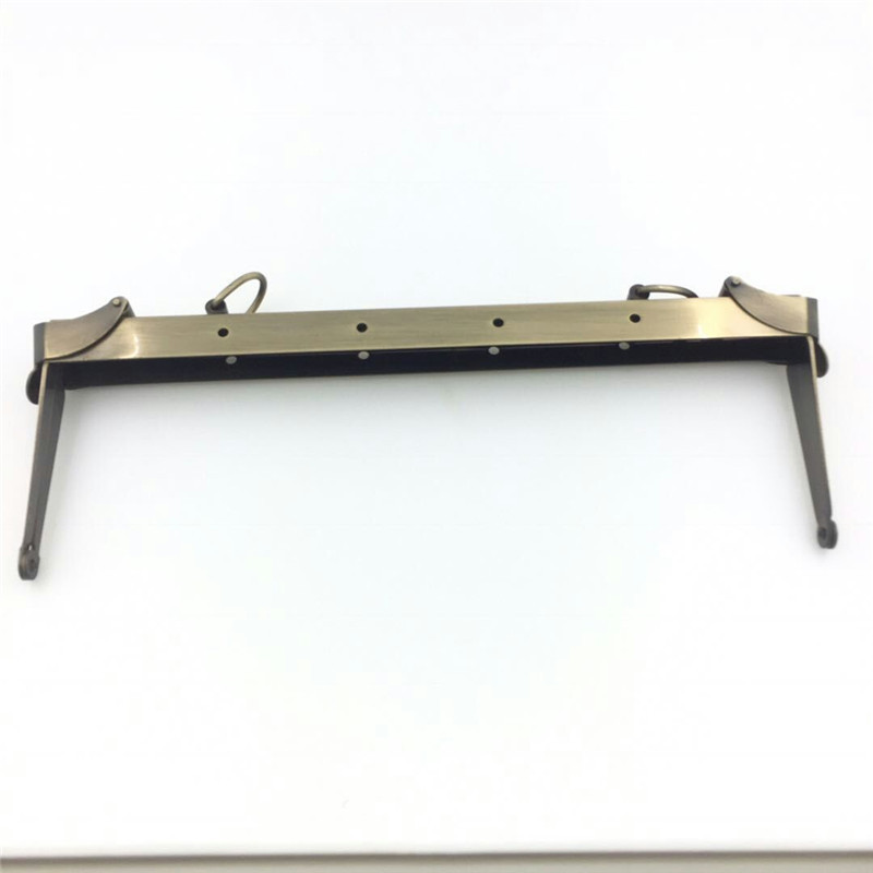 供应 五金手袋架  潮款晚装包夹子  复古铜口金较  男包五金框