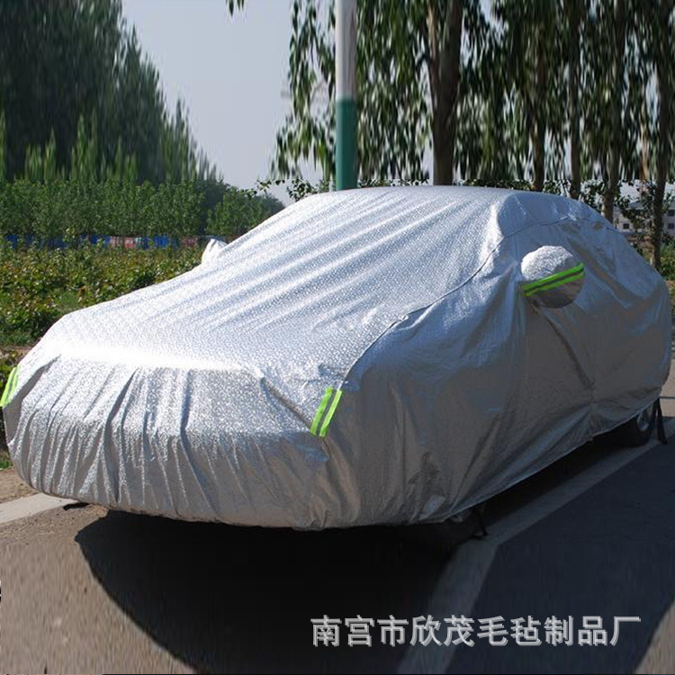 Directamente del fabricante, funda de aluminio para coche, resistente al sol, impermeable, a prueba de polvo, apta para todas las estaciones, funda de coche engrosada con envío directo en una sola pieza.